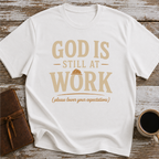 God Is Still At Work, Please Lower Your Expectations - T-Shirt